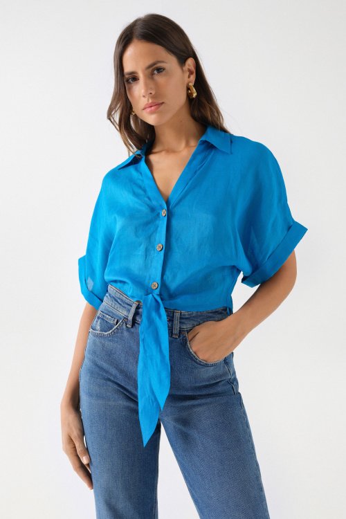 SHIRT WITH BOW AT THE HEM.